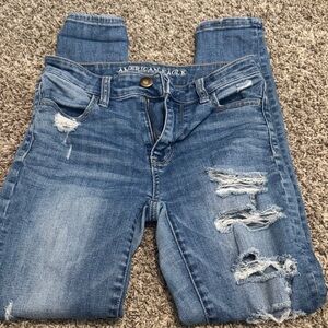 American Eagle Outfitters Women’s Distressed Light Blue Skinny Jeans
